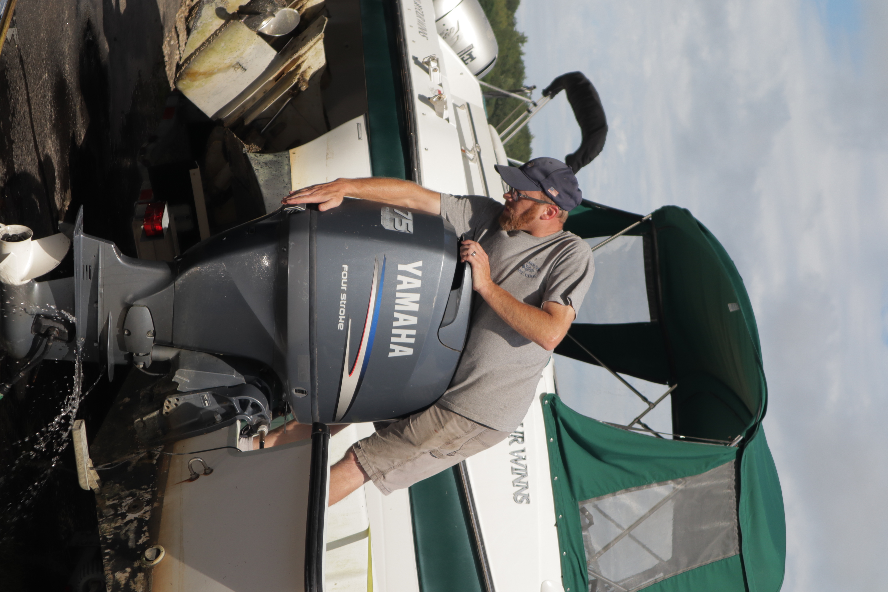 Ryan Coffin fixing Yamaha Outboard engine