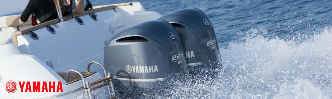 two gray Yamaha engine on a white boat
